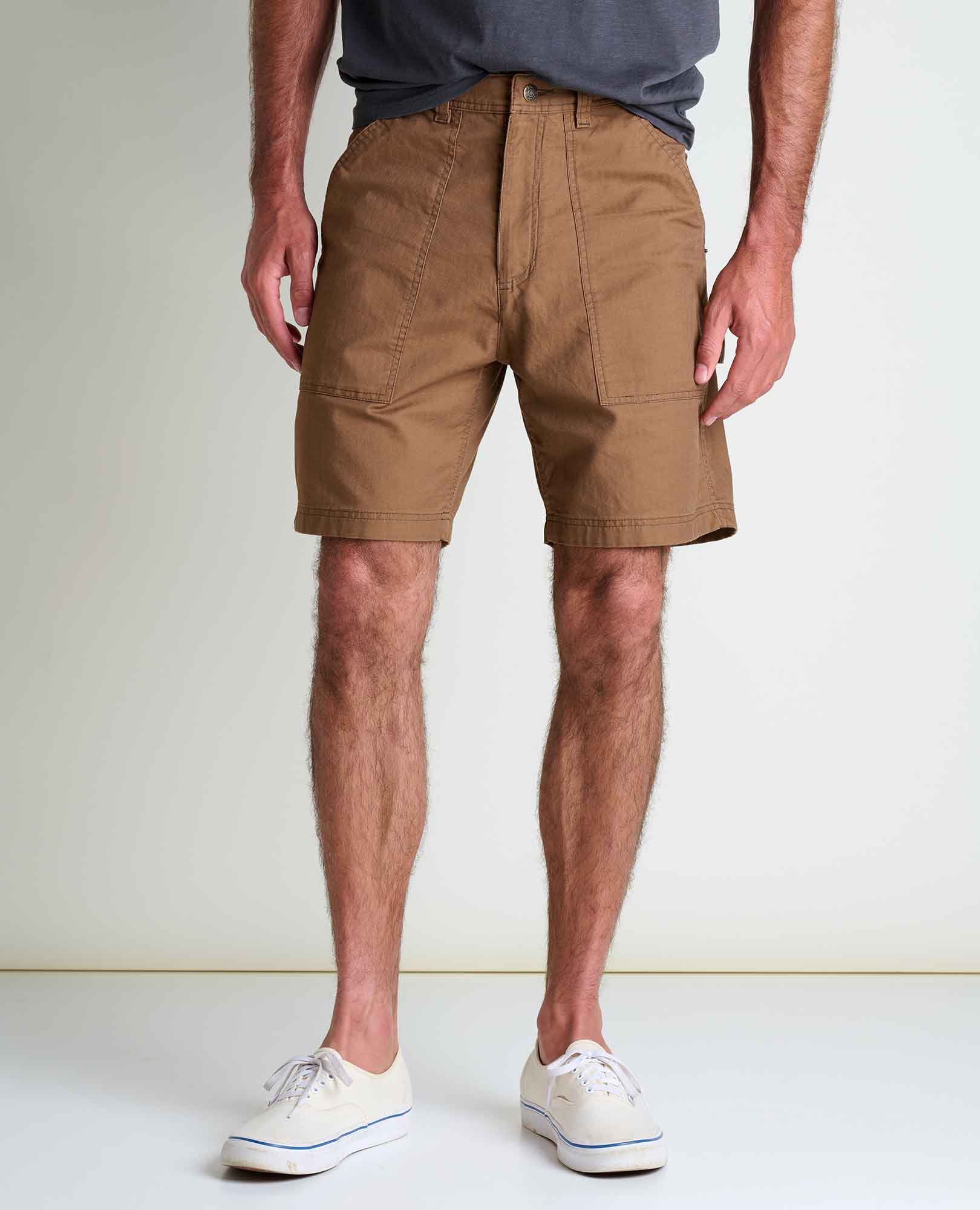 2" and is wearing a size 32.